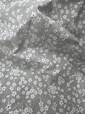 Beschichtete Baumwolle grau mit Blumen 0,5 m