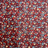 Beschichtete Baumwolle Bordeaux mit Blümchen 0,5m