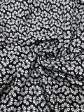 Bio Baumwolljersey Blumen Schwarz/Ecru 0,5 m