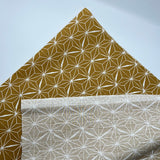 Beschichtete Baumwolle Ockergelb geometrisches Muster